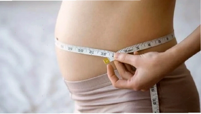 Mẹ bầu tuần 13 tăng cân và lộ rõ bụng bầu